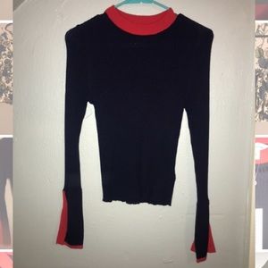 Dark blue long sleeve sweater w/ red flair